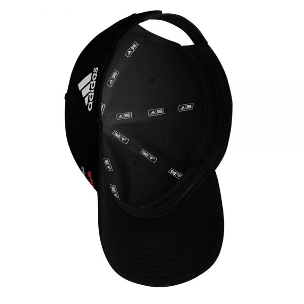 A black and white adidas hat with the Premier Pain Treatment Institute logo on the front