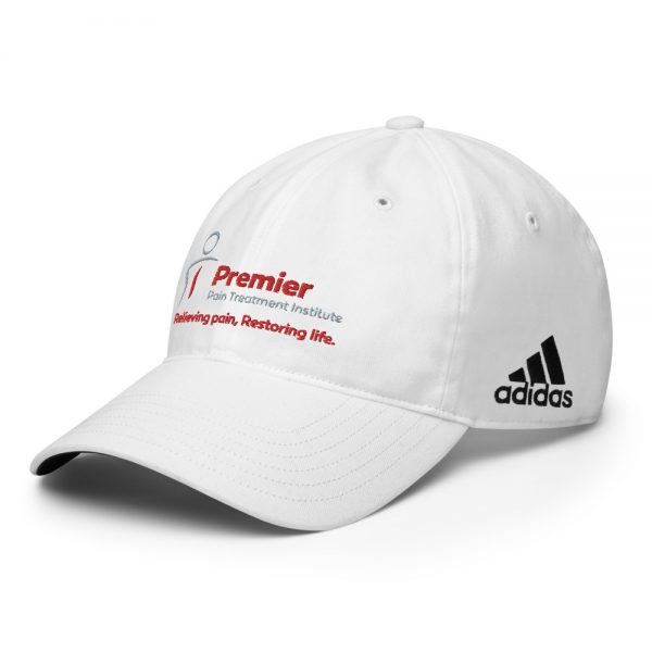 A black and white adidas hat with the Premier Pain Treatment Institute logo on the front