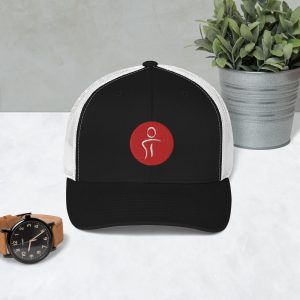 A black and white trucker hat with the Premier Pain Treatment Institute logo on the front