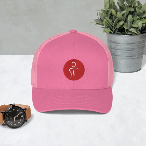 A pink hat with the Premier Pain Treatment Institute logo on the front