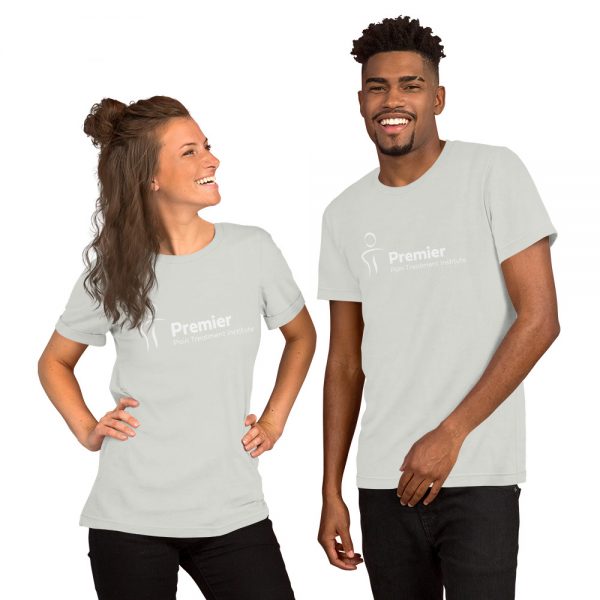 A man and woman wearing matching grey tshirts with the Premier Pain Treatment Institute logo on the front