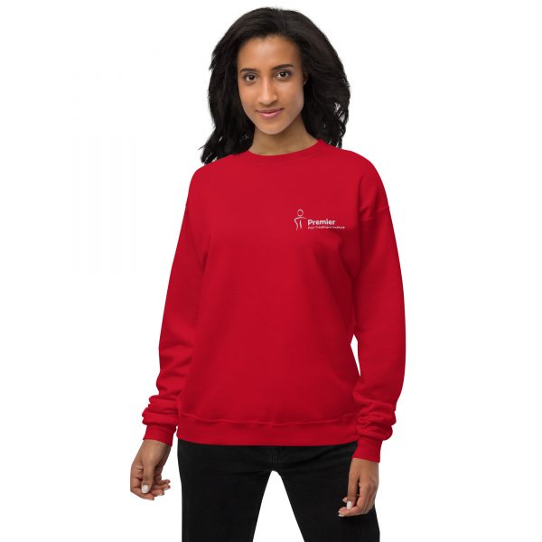 A female wearing a red long sleeve sweater with the Premier Pain Treatment Institute logo on the front