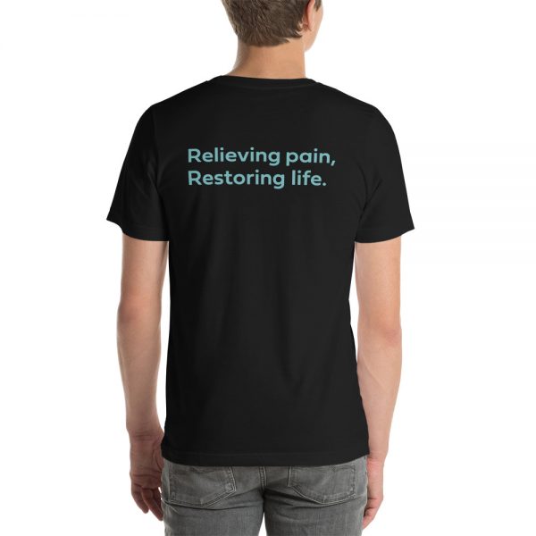 A male wearing a black tshirt with the words "relieving pain, restoring life" on the back