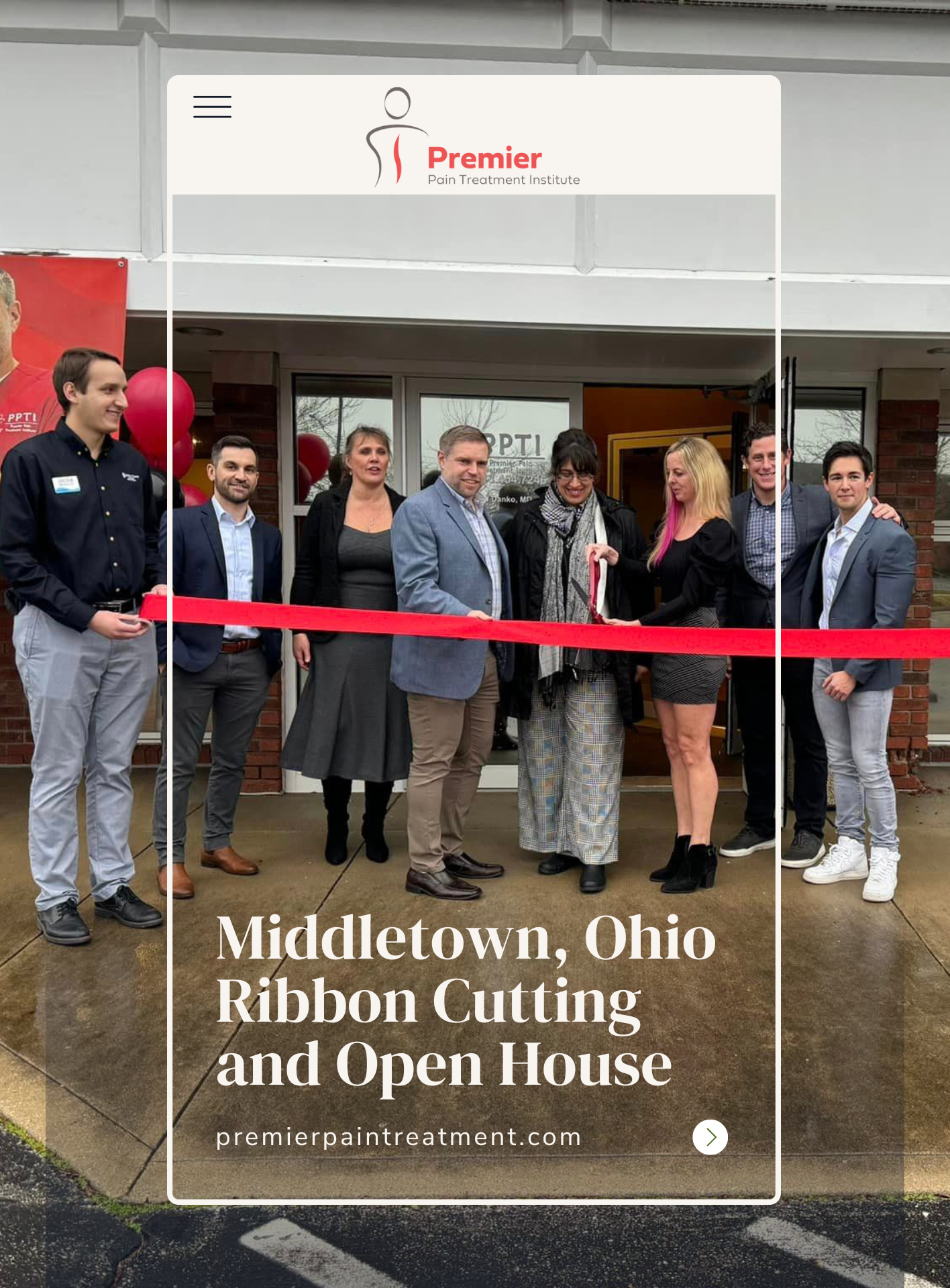 The team at Premier Pain Treatment Institute celebrate their Middletown, Ohio ribbon cutting with members of the City of Middletown